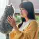 Illustration for article titled You're Supposed to Be Comforted by This Faceless Robotic Vibrating Cat, Not Horrified